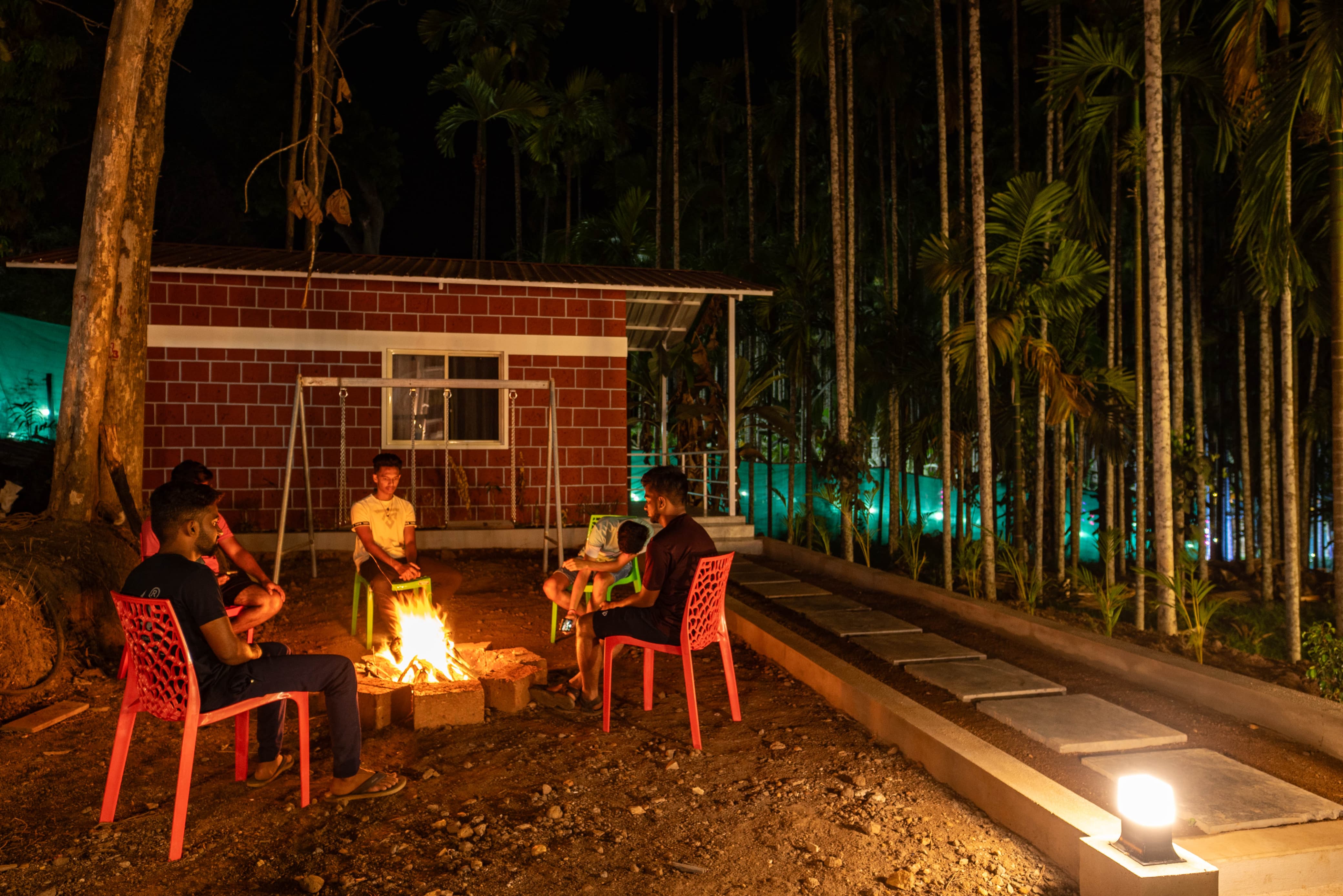 Students enjoying night swim in pool